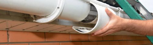 Roof gutter repair. Guttering repair. Roofer contractor repair house rain gutter pipeline.